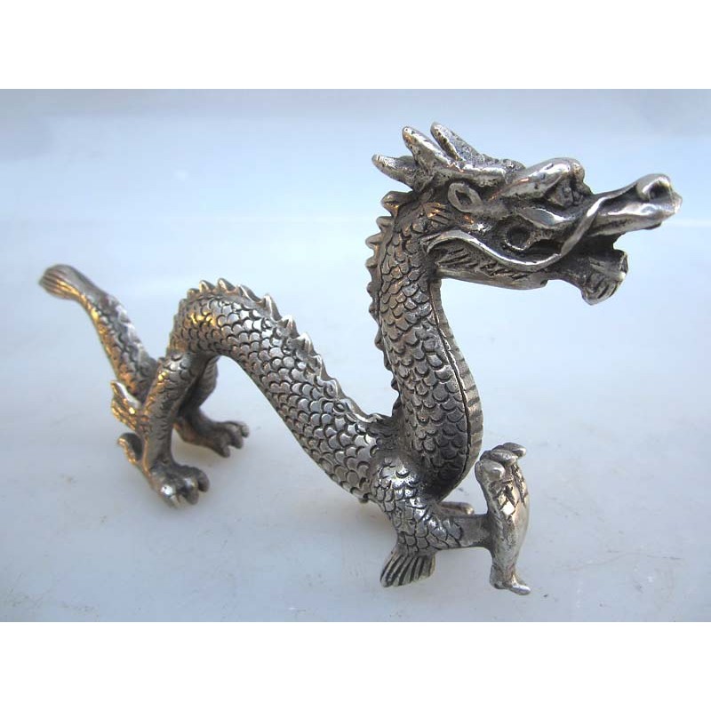 China. Bronze dragon in silvered bronze