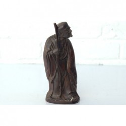 Bronze monk with stick