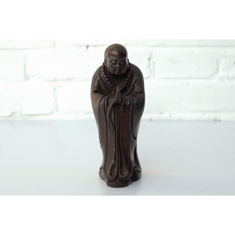 Bronze monk in meditation