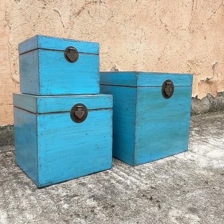 Nest of three blue lacquered trunks