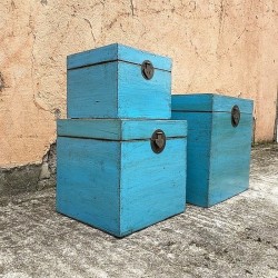 Nest of three blue lacquered trunks