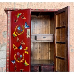 Antique red Chinese cabinet with butterflies