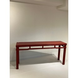 red laquered console table....