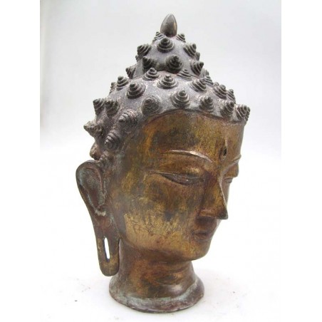 Buddha head in gilt bronze